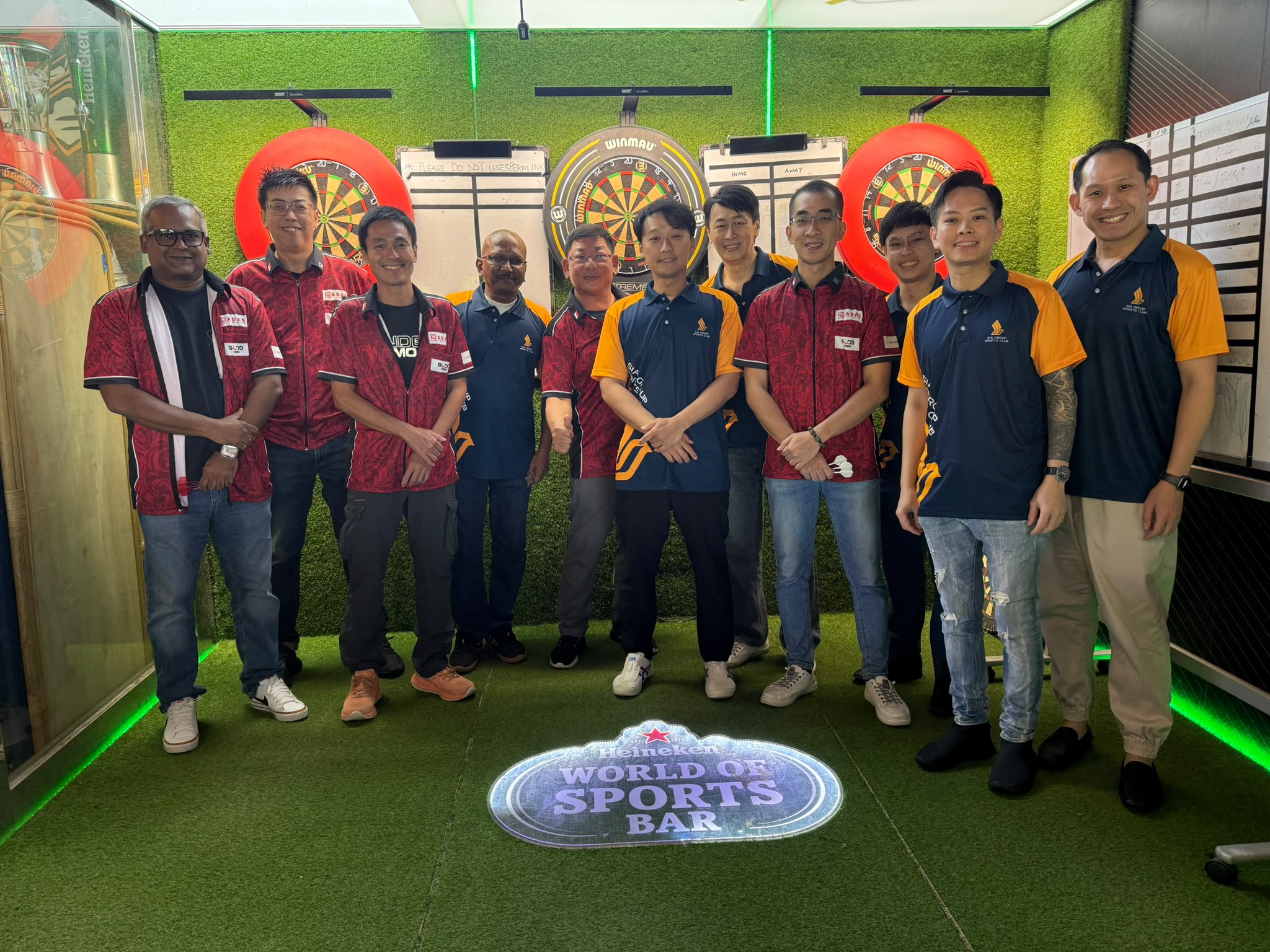 SIA Sports Club and ADAS Invitational Team players together after their match